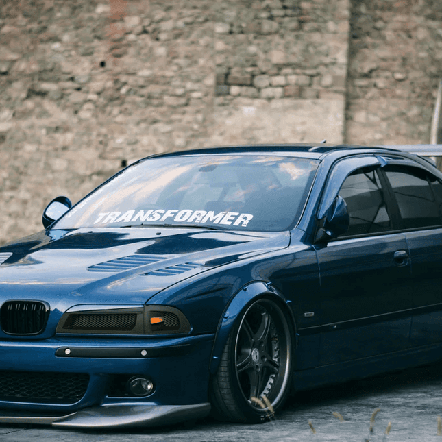 E39 cold air intake, high-flow air filter, performance intake system, optimized throttle response, race-spec induction, M5 air intake upgrade, track-ready airflow enhancement, high-performance air delivery, aggressive engine breathing, custom intake modification.

