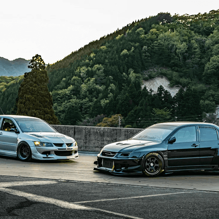 Mitsubishi Evo 7, 8, 9 adjustable carbon fiber GT wing, track-proven downforce optimization, high-speed rear stability, aggressive styling, JDM-spec aerodynamics, race-ready rear spoiler.

