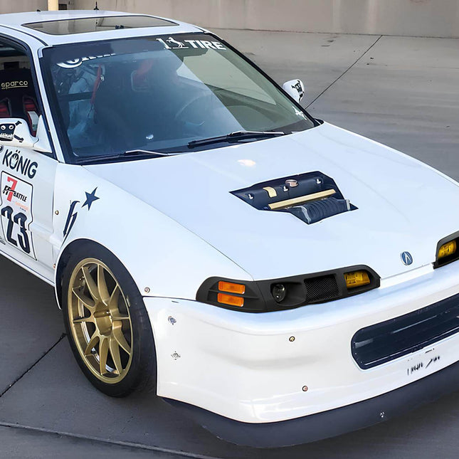 Acura Integra DB2 performance upgrade kit featuring custom spare parts for improved vehicle dynamics