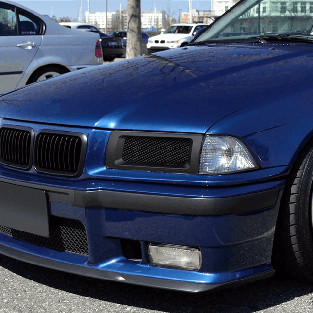 Aluminum skid plate for BMW E36 protects the engine and undercarriage from road debris and track impacts.