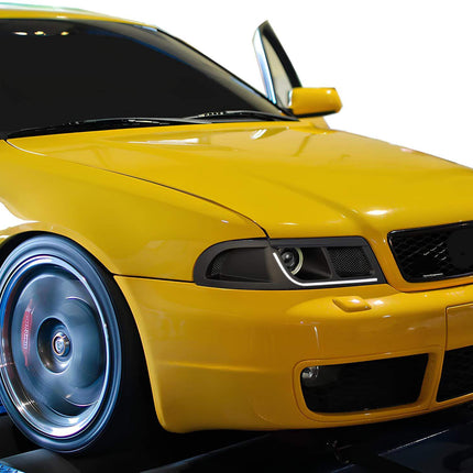 Revitalize your Audi A4 B5 S4 (1997-2001) headlight with this custom upgrade kit featuring a matte black finish, LED white/yellow signals, easy bracket mounting, robust protective mesh, and an air channel with a turbo-ready connector for improved performance.
