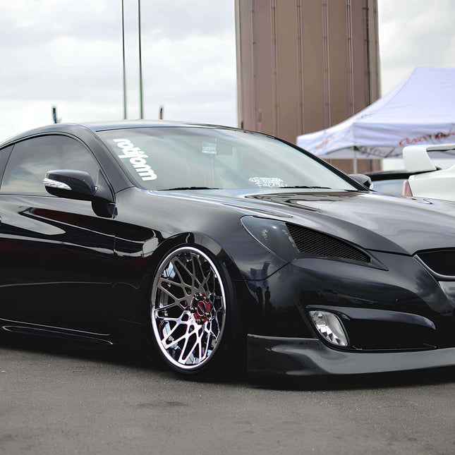 Hyundai Genesis Coupe body kit, widebody fenders, carbon fiber hood, front lip, rear diffuser, side skirts, JDM-style grille, aggressive aerodynamics, track-inspired design, lightweight body panels, performance styling, race-ready aesthetics.