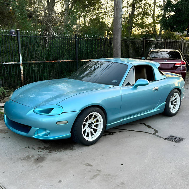 Mazda Miata MX-5 NB1 camber kit, adjustable control arms, precise suspension tuning, JDM-spec alignment, improved tire contact, aggressive stance, race-proven suspension geometry, track-ready suspension adjustment.

