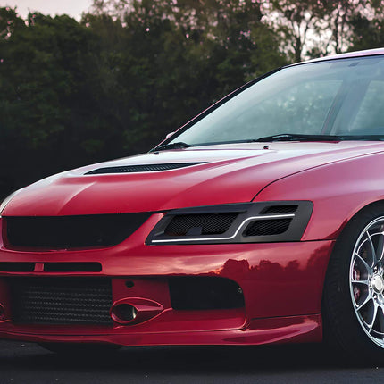 Mitsubishi Evo 7, 8, 9 adjustable coilover suspension kit, full damping adjustability, ride height tuning, track-spec spring rates, race-proven handling response, aggressive stance improvement.

