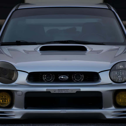 Subaru Outback racing bucket seats, lightweight carbon fiber construction, FIA-approved bolstered support, track-ready seating upgrade.


