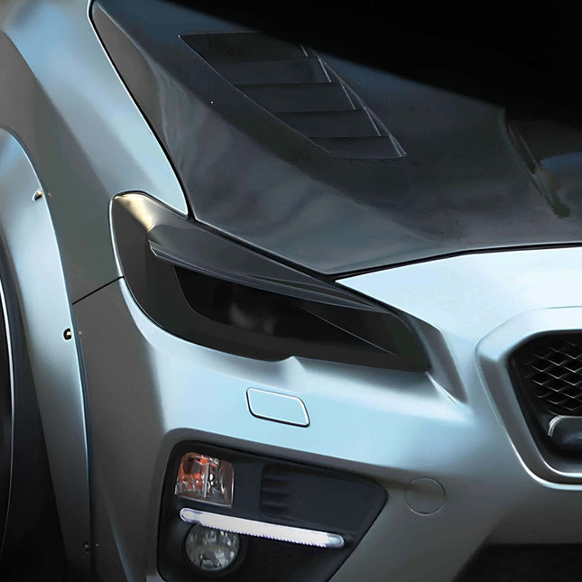 Subaru WRX STI Raptor Eye big brake kit, multi-piston calipers, drilled and slotted rotors, high-friction ceramic brake pads, track-ready stopping power.

