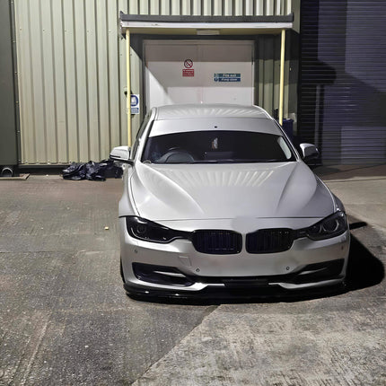F31 carbon fiber front splitter, F34 aerodynamic styling upgrade, F35 aggressive front-end styling, track-ready downforce improvement, high-performance exterior styling, lightweight carbon fiber front lip upgrade.
