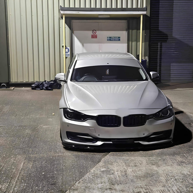 F31 carbon fiber front splitter, F34 aerodynamic styling upgrade, F35 aggressive front-end styling, track-ready downforce improvement, high-performance exterior styling, lightweight carbon fiber front lip upgrade.