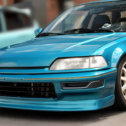 Civic EF9, SiR, and Si-R front and rear strut bars to improve chassis rigidity and cornering stability. Available in aluminum or carbon fiber for lightweight strength.


