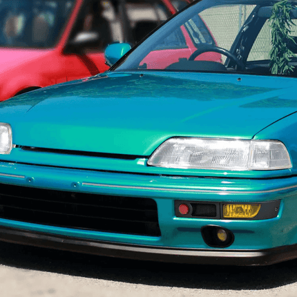 Sport bucket seats for Honda Civic EF9, SiR, and Si-R, featuring racing-inspired design, enhanced bolstering, and lightweight materials for maximum driver support and comfort.

