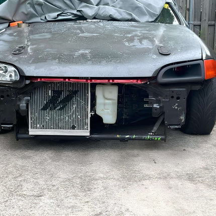 "Honda Civic EH brake upgrade kit – high-performance drilled and slotted rotors, ceramic brake pads, and stainless steel brake lines for improved stopping power, heat dissipation, and durability in street and track conditions."


