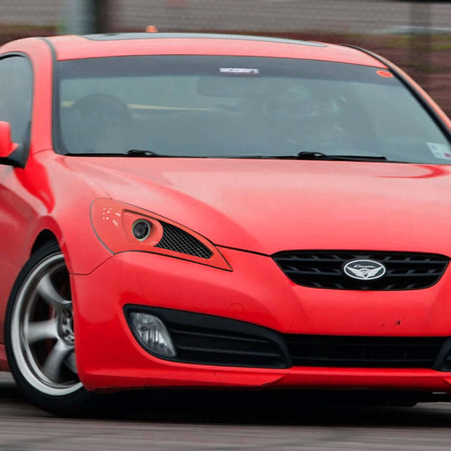 Genesis Coupe front splitter, carbon fiber aerodynamic upgrade, wind tunnel-tested airflow improvement, increased downforce, track-spec handling, JDM-style styling, aggressive front-end modification, race-inspired aerodynamics.

