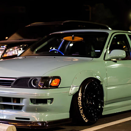 Toyota Corolla AE101 upgraded throttle body, increased airflow capacity, optimized throttle response, race-tuned induction system, track-proven power enhancement, dyno-tested performance gains.

