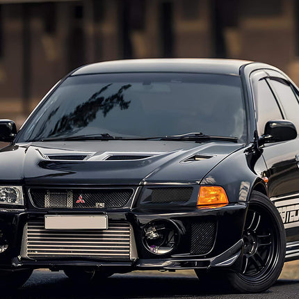 Mitsubishi Evolution V, VI full exhaust system, stainless steel turbo-back exhaust, high-flow catalytic converter, titanium muffler tips, aggressive race sound, dyno-tested power gains, lightweight performance exhaust upgrade.


