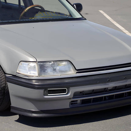 Carbon fiber hood for 1988-1991 Honda Civic EF and CRX, offering a lightweight alternative to the OEM hood with improved aerodynamics and heat dissipation. Ideal for reducing vehicle weight and enhancing the sporty appearance of your build.


