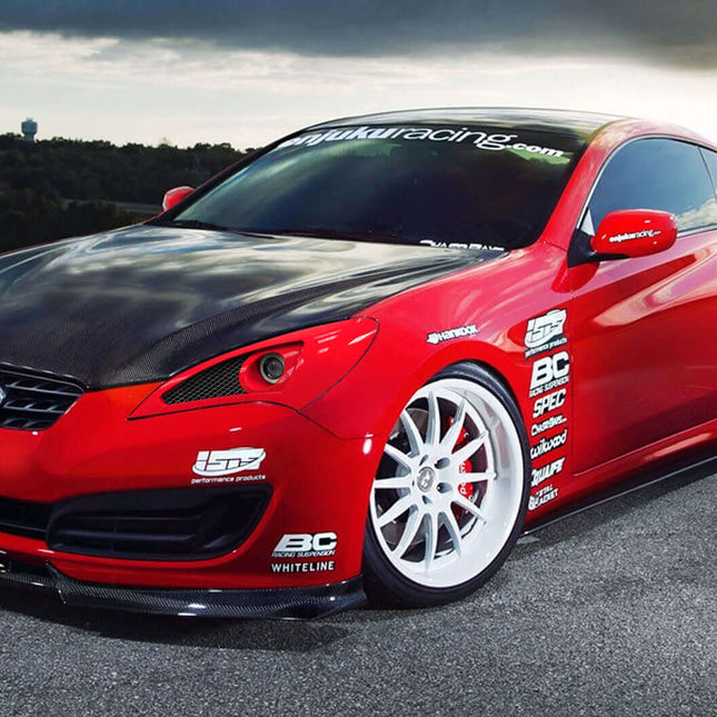 Hyundai Genesis Coupe fuel surge tank, high-pressure fuel pump, upgraded fuel injectors, E85-compatible fuel system, race-spec pressure regulator, high-performance fuel rail, optimized forced induction fueling, track-spec upgrade.

