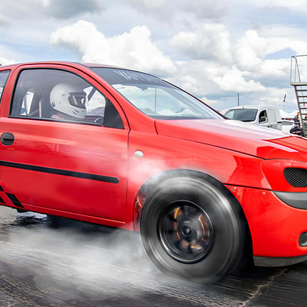"A clean Chevrolet Corsa with factory paint and stock wheels, representing a reliable and fuel-efficient city car."