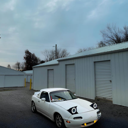 Mazda Miata MX-5 NA Roadster high-output LED turn signals, ultra-bright amber sequential flashers, front bumper indicator kit, sleek modern vehicle styling, improved road awareness upgrade.

