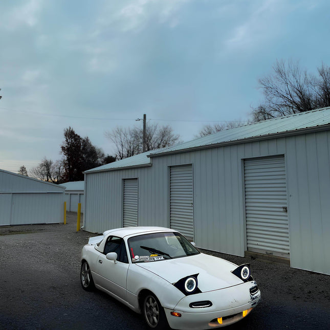 Mazda Miata MX-5 NA Roadster high-output LED turn signals, ultra-bright amber sequential flashers, front bumper indicator kit, sleek modern vehicle styling, improved road awareness upgrade.


