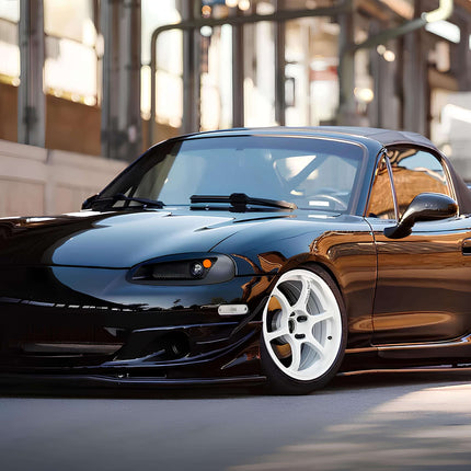 Mazda Miata MX-5 NB2 racing bucket seats, lightweight carbon fiber seats, bolstered support, track-ready fitment, suede and leather finish, high-performance interior upgrade, aggressive seating position, JDM racing setup.

