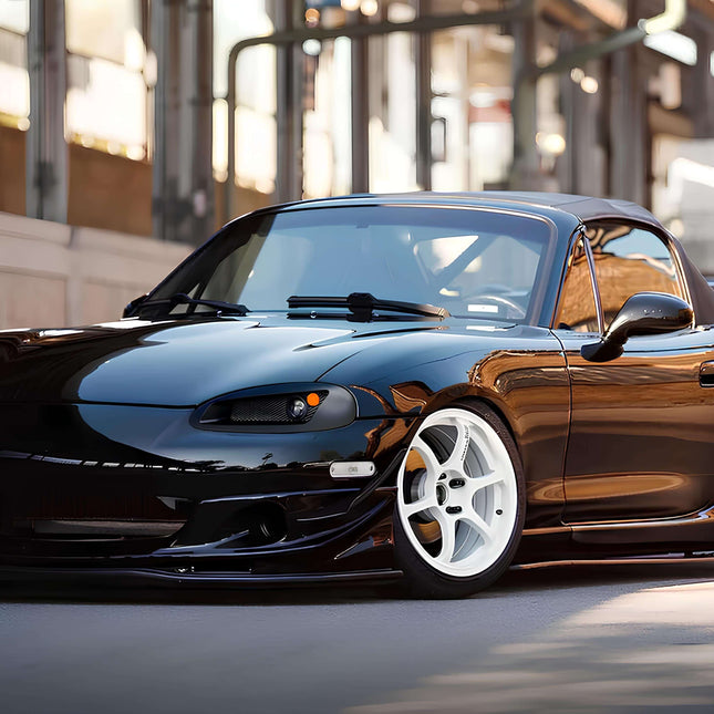 Mazda Miata MX-5 NB2 racing bucket seats, lightweight carbon fiber seats, bolstered support, track-ready fitment, suede and leather finish, high-performance interior upgrade, aggressive seating position, JDM racing setup.

