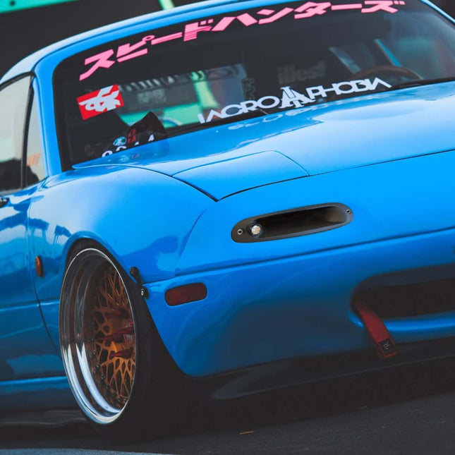 Miata MX-5 NA Roadster LED turn signals, smoked or clear bumper-mounted indicator lights, sequential amber flashers, plug-and-play signal upgrade, improved road safety, modern styling enhancement.

