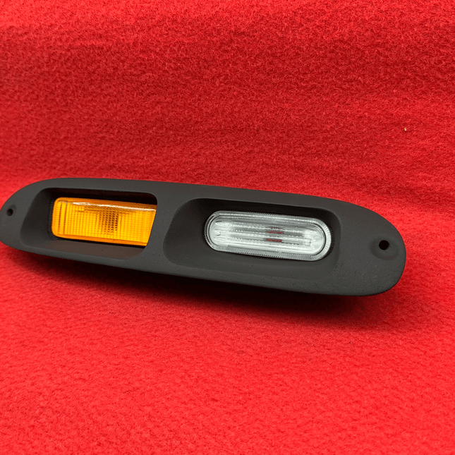 Miata MX-5 NA Roadster upgraded front turn signals, bumper-mounted LED indicators, sequential amber flashers, aggressive road visibility, crystal-clear lens housing, plug-and-play modern styling enhancement.

