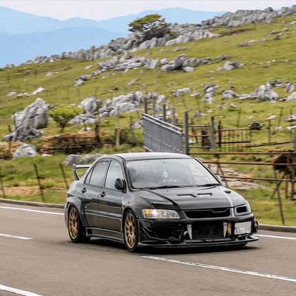 Lancer Evolution VII, VIII, IX aluminum racing radiator, dual-core high-efficiency cooling, reinforced silicone hoses, optimized heat dissipation, track-ready cooling upgrade, high-performance temperature management system.

