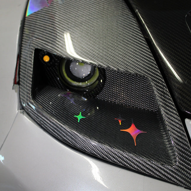 Nissan 350Z custom carbon fiber side skirts designed to enhance aerodynamics and give your car a lowered, aggressive stance. Lightweight yet durable, these side skirts improve airflow efficiency, reduce drag, and add a premium motorsport-inspired look to your 350Z exterior styling.