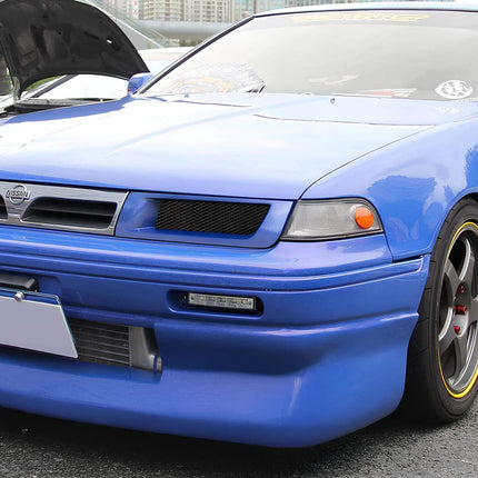 1988-1994 Nissan Cefiro A31 carbon fiber rear diffuser, wind tunnel-tested aerodynamic enhancement, reduced drag, high-speed stability, aggressive styling, track-ready airflow management.

