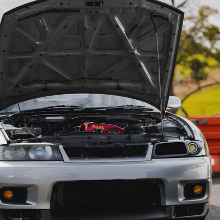Skyline R33 GTS S1 polyurethane engine mounts, reinforced chassis stability, reduced engine vibration, optimized torque application, track-proven performance enhancement.

