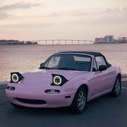 Racing headers for Mazda Miata 1990-1997 optimize exhaust flow, reduce restrictions, and increase horsepower for a more responsive engine. | 6. Lightweight forged wheels for MX-5 Miata improve handling by reducing unsprung weight and increasing accelerati
