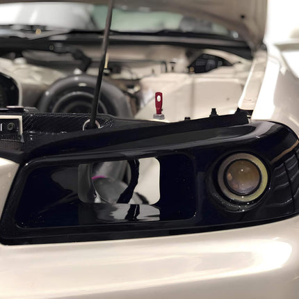 Nissan Skyline R34 polyurethane engine mounts, improved drivetrain stability, reduced engine vibration, optimized power application.


