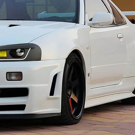 Skyline R34 high-speed front splitter, wind tunnel-tested aerodynamics, reduced drag coefficient, optimized high-speed handling, improved front-end stability.

