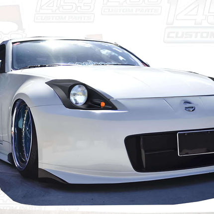 350Z oversized performance radiator, high-capacity cooling system, reinforced silicone hoses, optimized engine heat dissipation, race-proven endurance upgrade.

