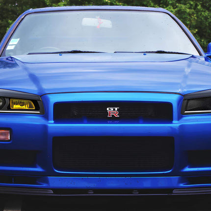 Nissan Skyline R34 short shifter kit, titanium shift knob, precision quick-shifting response, weighted ergonomic design, track-ready transmission engagement, aggressive gear changes.

