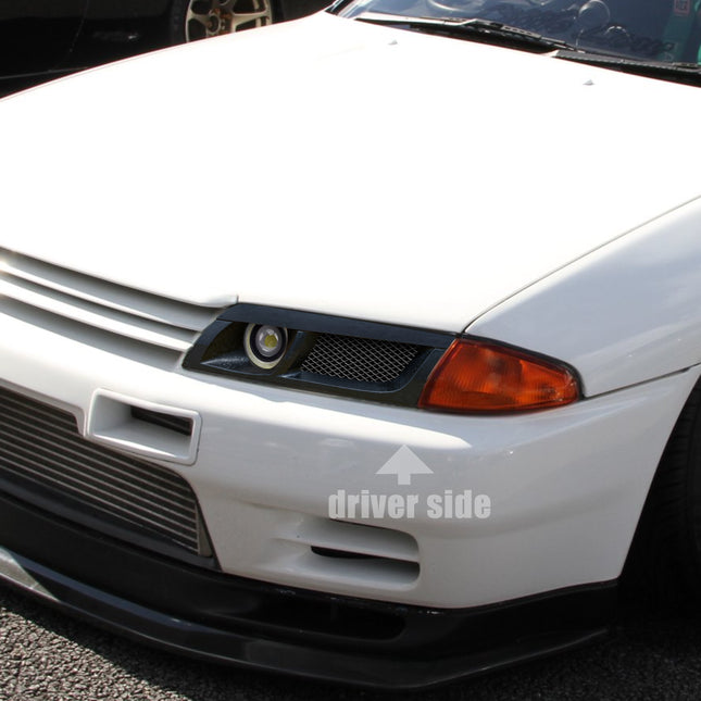 Explore premium performance parts for the Nissan Skyline GT-R R32, including headlight air intake systems, air ducts, and custom upgrade components.