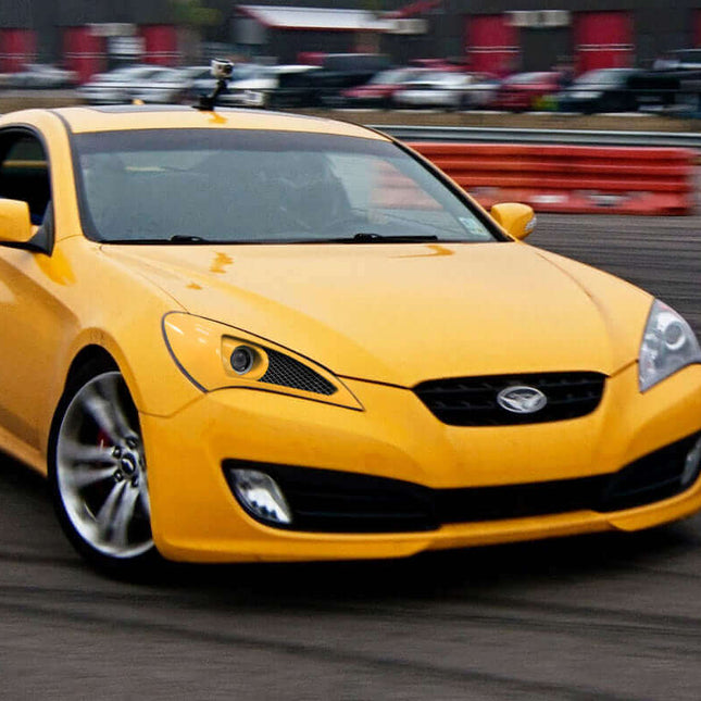 Genesis Coupe titanium shift knob, short shifter assembly, high-speed gear engagement, JDM-style transmission upgrade, smooth shift feel, weighted gear knob, track-inspired manual shifting precision, performance transmission upgrade.

