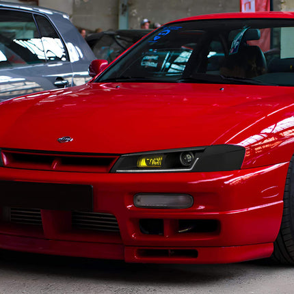 240SX carbon fiber vented hood, lightweight race-spec construction, improved engine cooling, track-optimized heat dissipation, aggressive styling, high-performance airflow efficiency.

