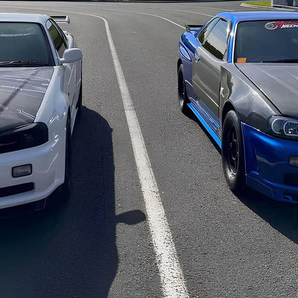 Skyline R34 GTS single turbo conversion, billet compressor wheel, oversized front-mount intercooler, stainless steel turbo manifold, race-proven boost control, dyno-tested turbo upgrade, increased forced induction efficiency.

