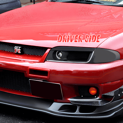 Nissan Skyline R33 GTR racing bucket seats, lightweight carbon fiber construction, bolstered support, aggressive track-spec seating, high-performance interior upgrade.

