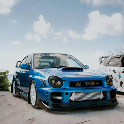 WRX STI rear subframe reinforcement brace, improved chassis stiffness, track-tuned handling upgrade, aggressive cornering response, race-spec rigidity enhancement.

