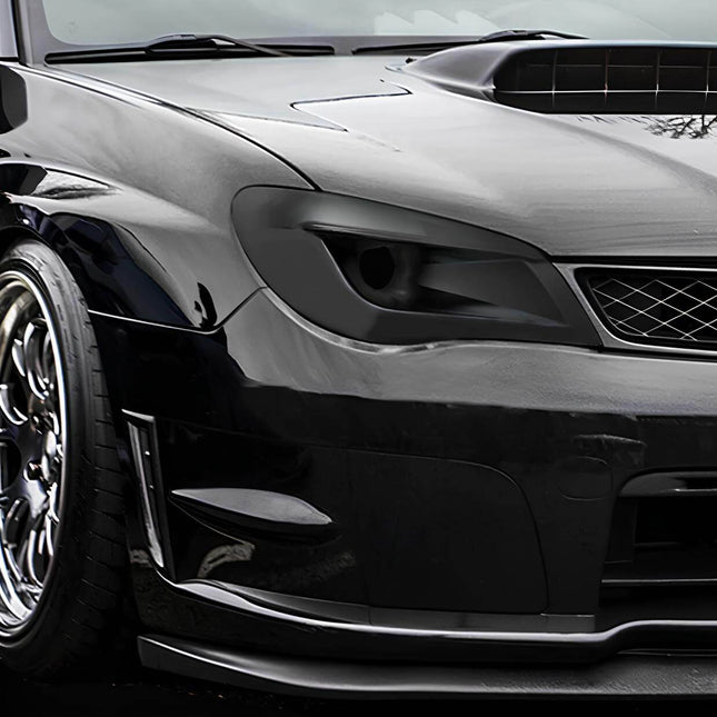 2006-2007 WRX STI cold air intake system, high-flow air filter, carbon fiber intake pipe, optimized throttle response, increased airflow efficiency, aggressive induction sound, race-tuned air delivery.

