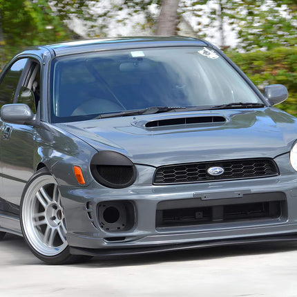 2002 WRX STI drift-spec angle kit, extended steering geometry, improved drift response, aggressive front-end handling modification.


