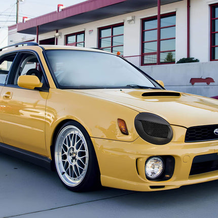 2002 WRX roll cage, FIA-approved welded tubular steel construction, reinforced chassis safety, race-ready track compliance.

