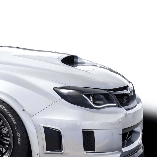 Subaru WRX STI rear subframe reinforcement brace, improved chassis stiffness, track-tuned handling upgrade, aggressive cornering response, race-spec rigidity enhancement.

