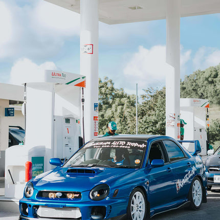 WRX high-performance oil cooler system, billet aluminum housing, stainless steel braided lines, race-proven thermal management, track-ready cooling efficiency.

