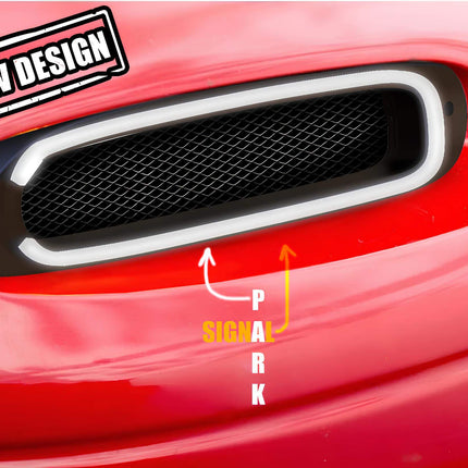 Mazda Miata MX-5 NA Roadster front bumper LED signal conversion, bright amber sequential flashers, track-ready safety enhancement, plug-and-play installation, stylish front-end visibility upgrade.

