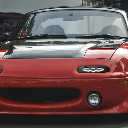 Miata MX-5 NA Roadster high-performance sway bars, front and rear stabilizer bars, reinforced end links, track-tuned suspension setup, high-performance cornering control, JDM-spec handling upgrade.

