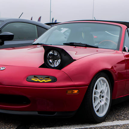 Mazda Miata MX-5 NA Roadster forged lightweight wheels, deep dish rims, JDM-spec offset, concave profile, 15-inch, 16-inch staggered fitment, high-performance tires, aggressive stance, track-proven handling.

